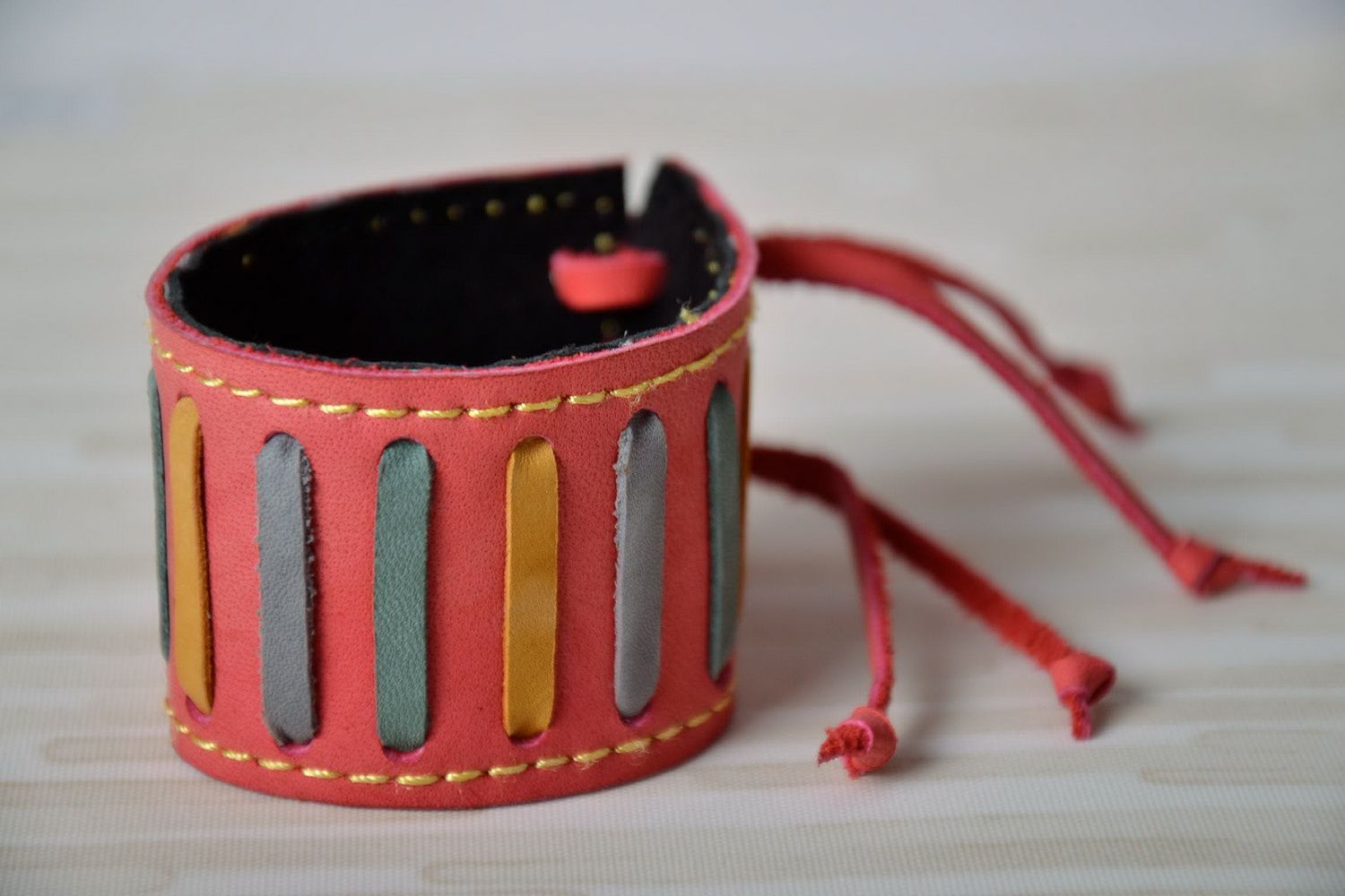 Leather bracelet with a cord photo 1