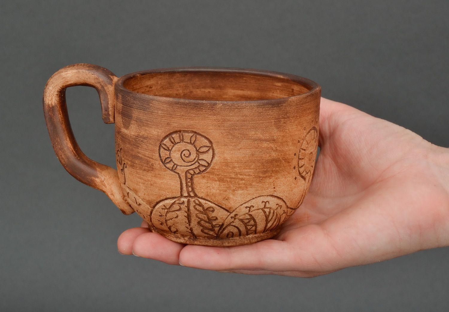 6 oz clay coffee cup with handle and cave drawings photo 4
