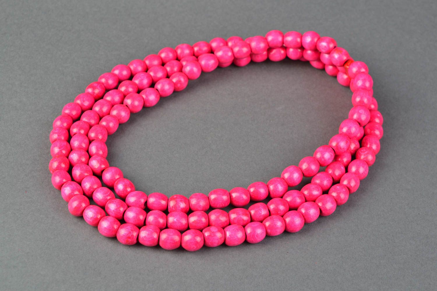 Pink handmade wooden bead necklace in three rows photo 4