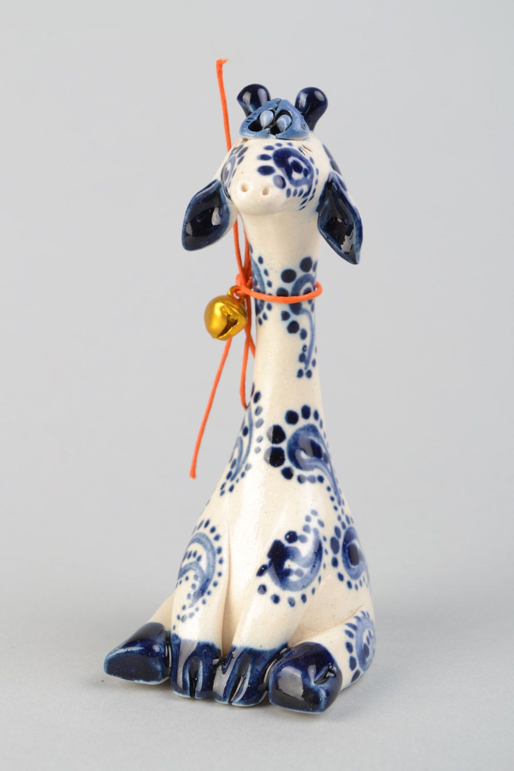 Handmade small ceramic figurine of giraffe painted with white and blue glaze photo 3