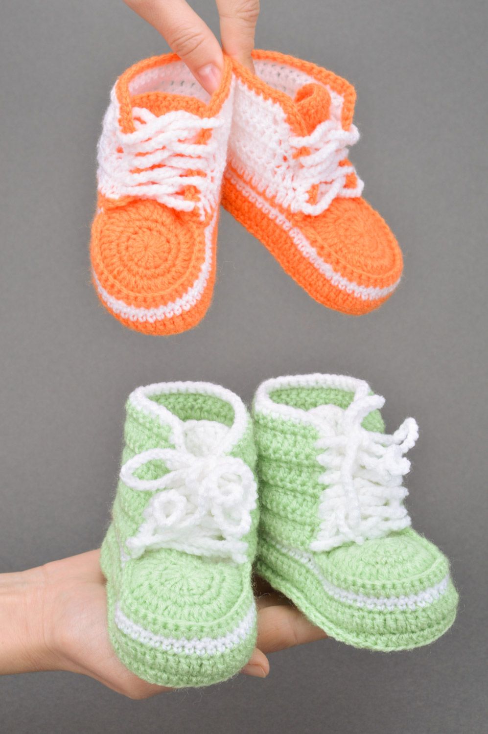 A set of handmade crocheted baby booties two pairs of light green and orange colors photo 3