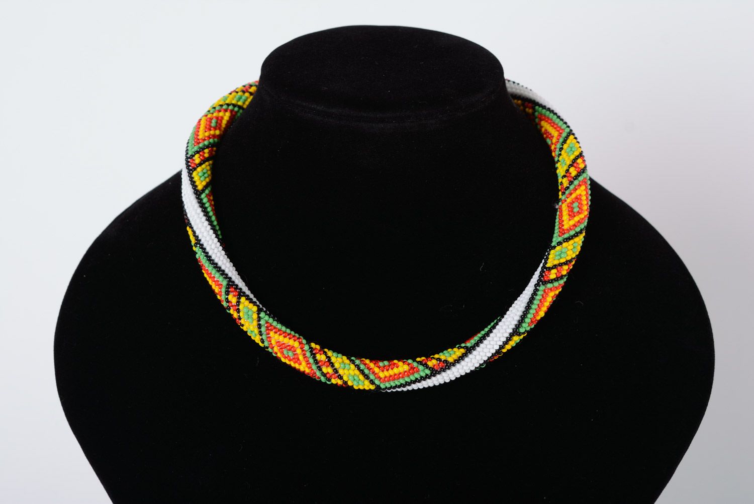 Festive handmade woven beaded cord necklace with geometric pattern photo 2