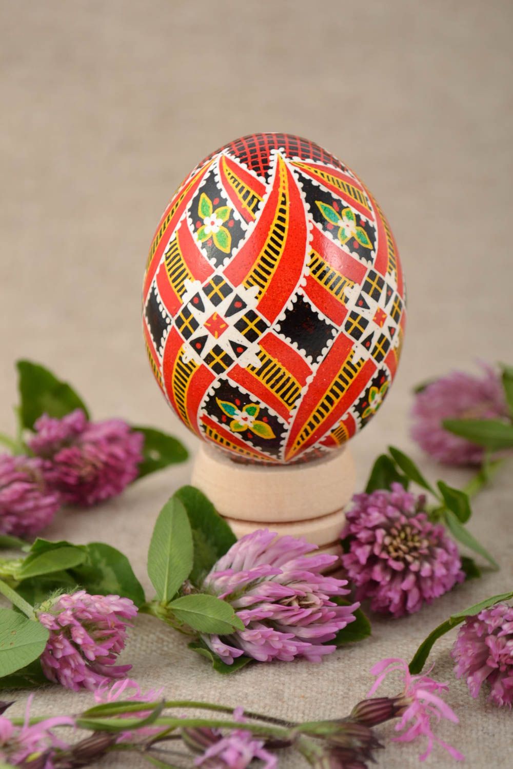 Bright handmade Easter egg painted with acrylics based on hollow chicken egg photo 1