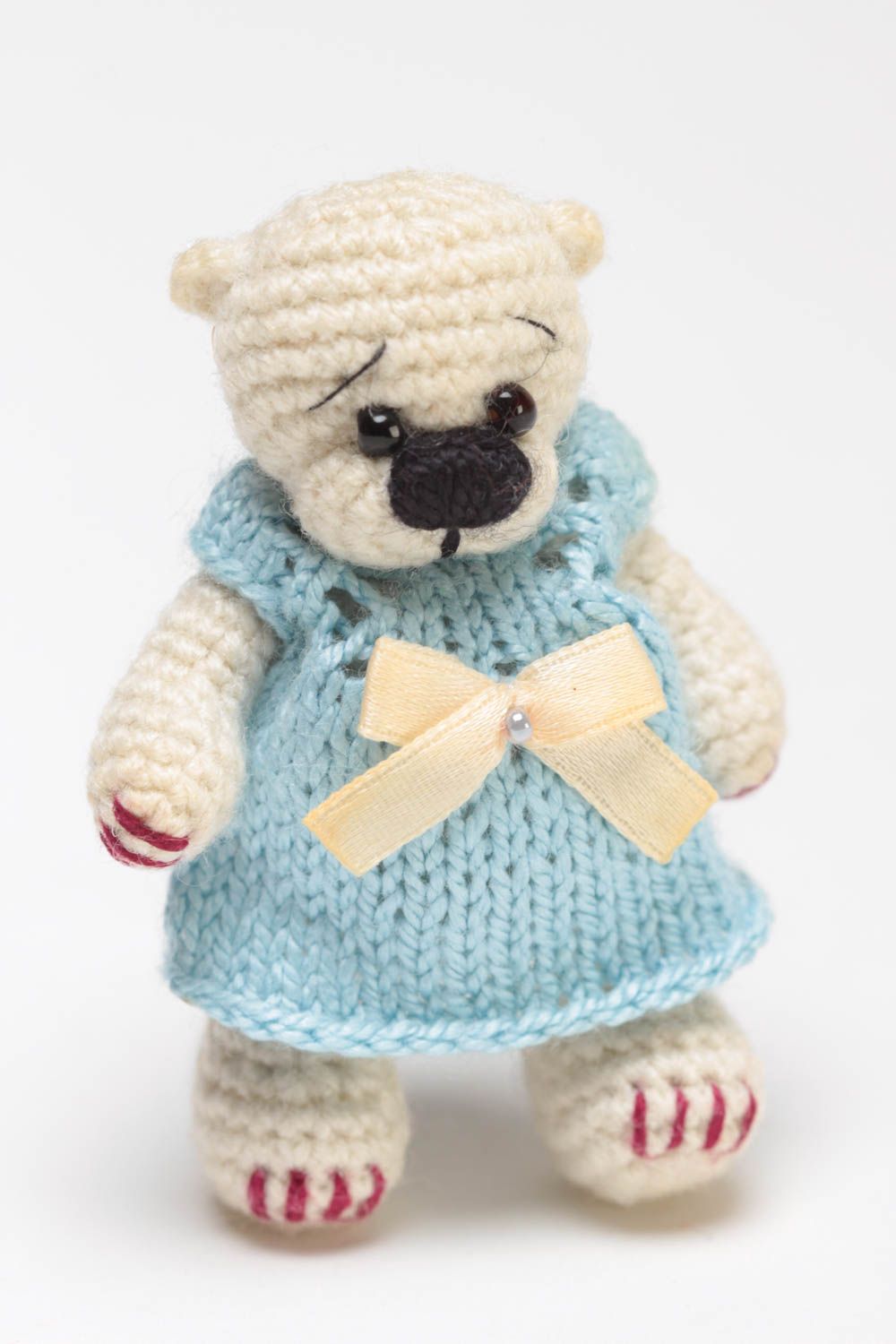 Handmade small crocheted soft toy beige bear girl in blue dress with bow photo 2