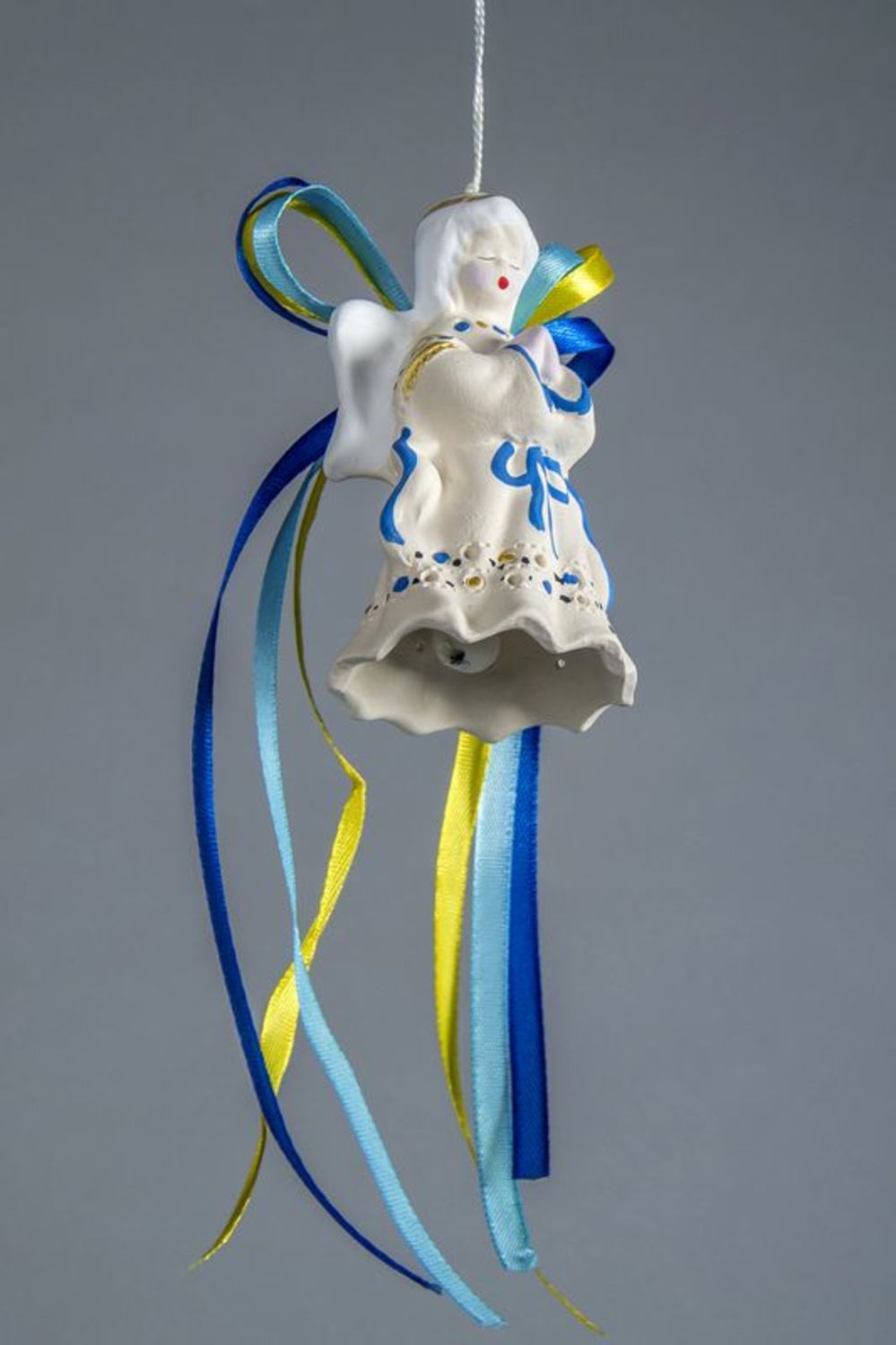 Ceramic bell in the form of an angel photo 1