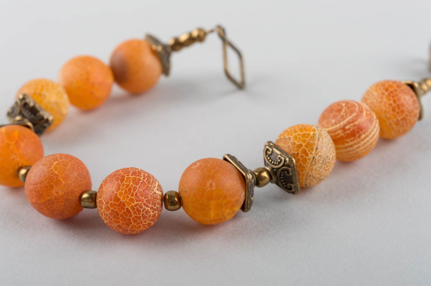 Beautiful elegant orange designer handmade bracelet made of agate and brass photo 5