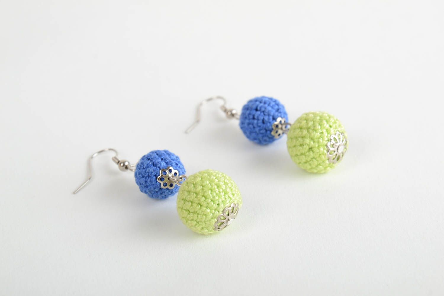 Handmade earrings with beads crocheted over with yellow and blue threads photo 4