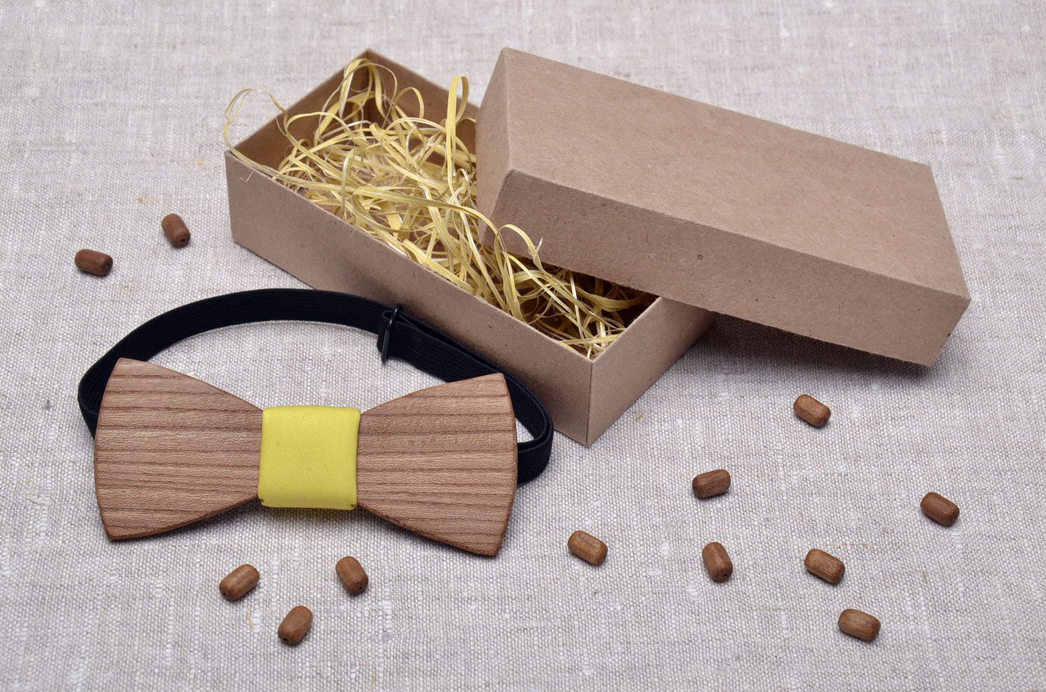 Wooden bow tie with yellow center photo 1