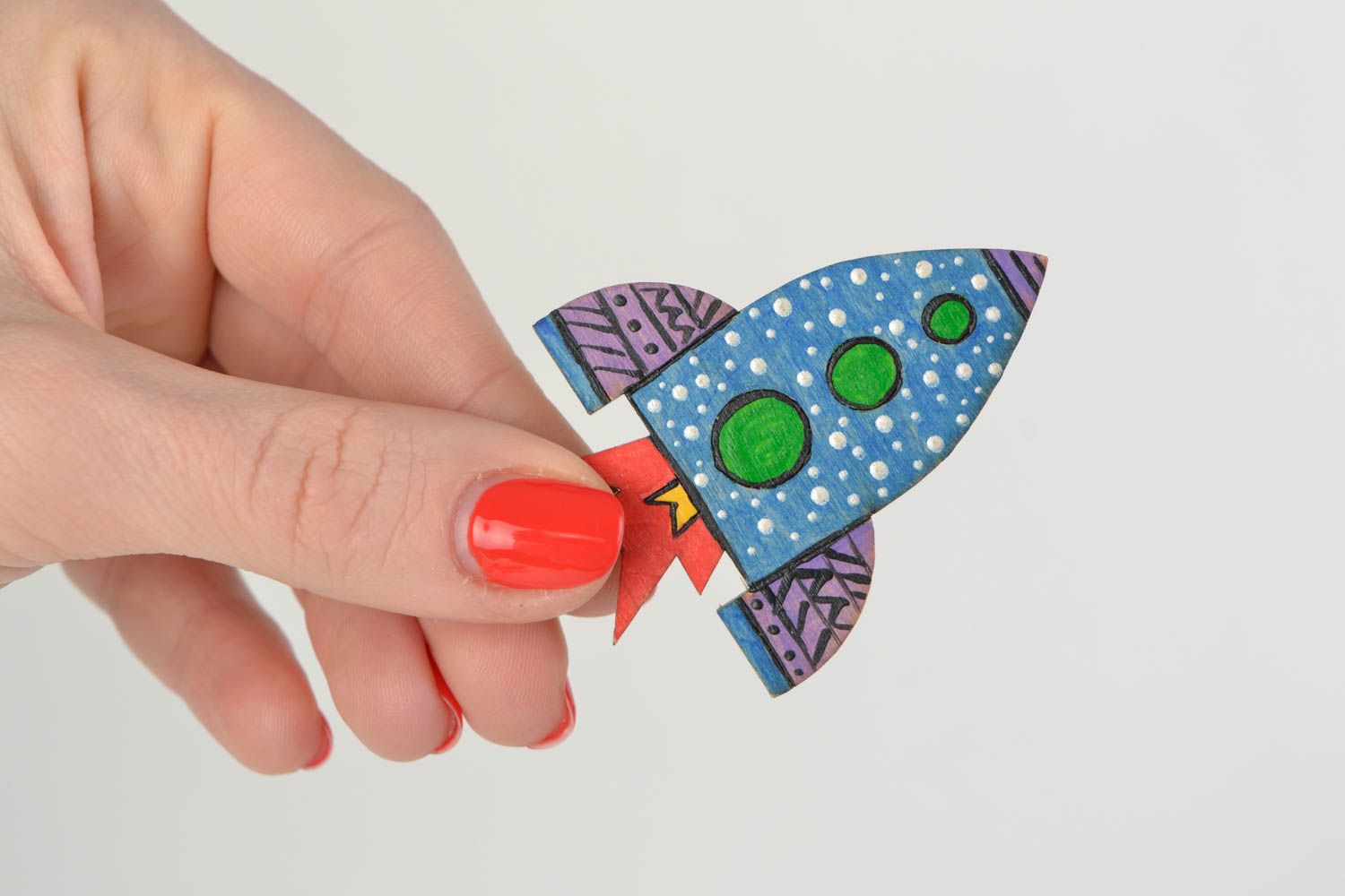 Handmade designer wooden brooch painted with acrylics in the shape of rocket photo 2