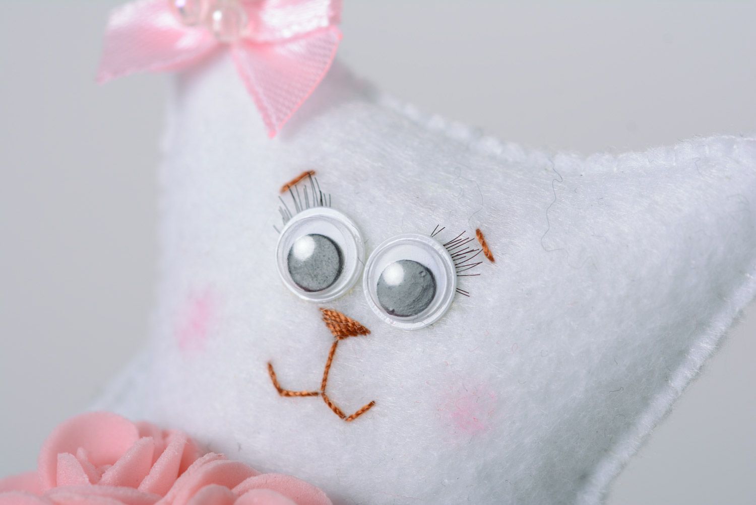 Handmade interior designer soft toy made of felt white cat with flowers  photo 2
