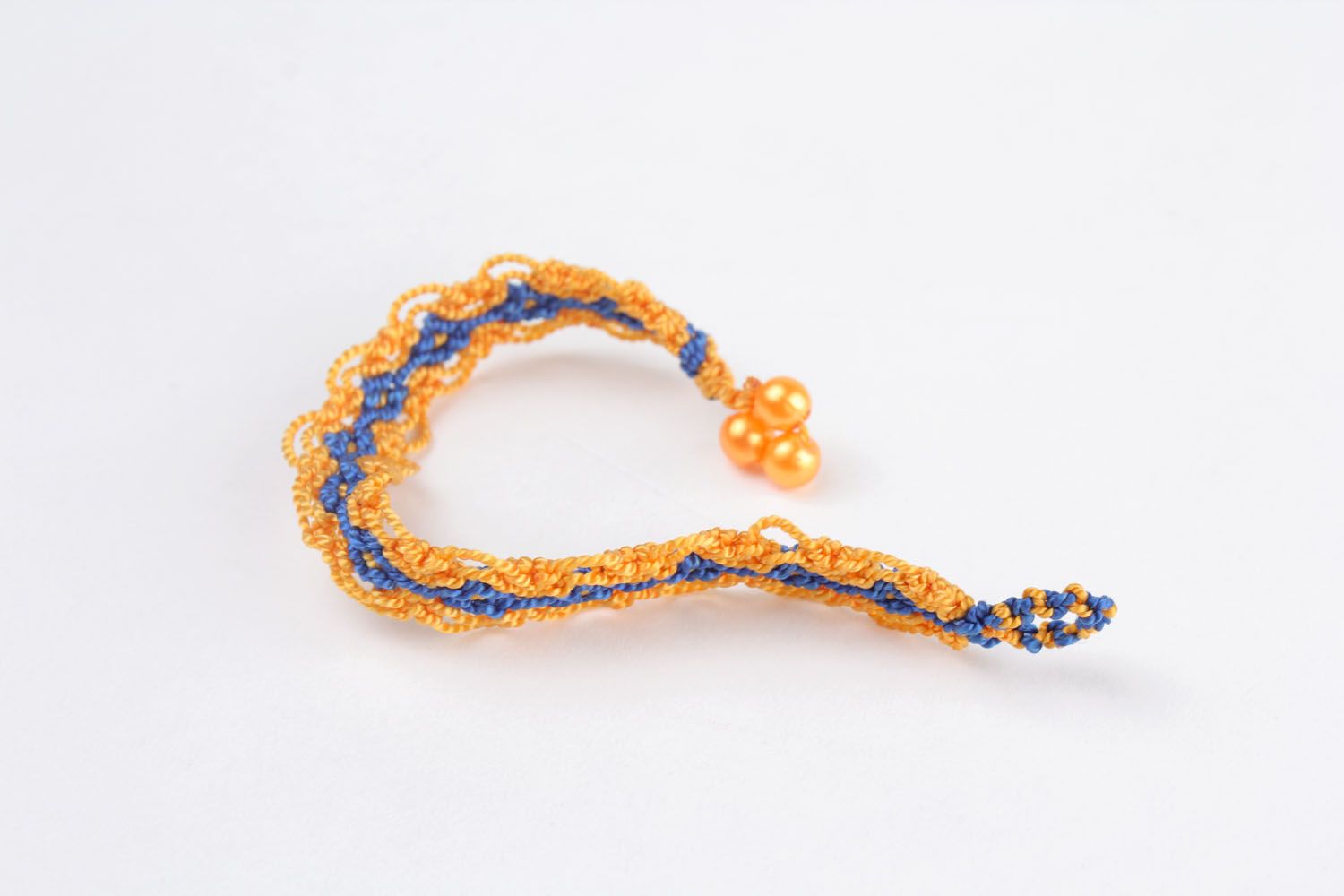 Yellow and blue woven bracelet photo 5