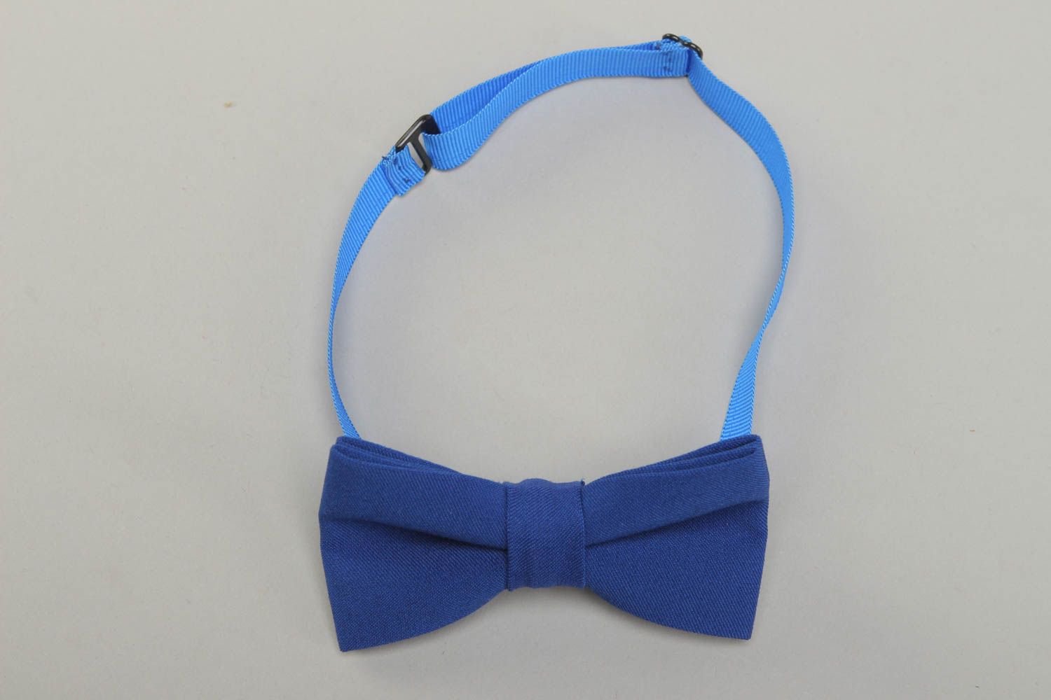 Fabric bow tie of dark blue color photo 1