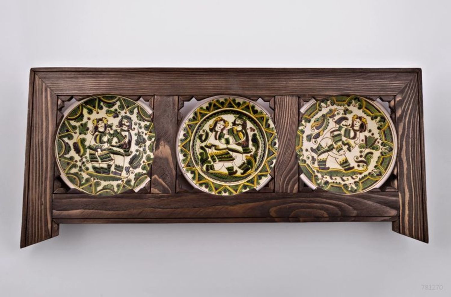 Decorative shelf with ceramic plates photo 2