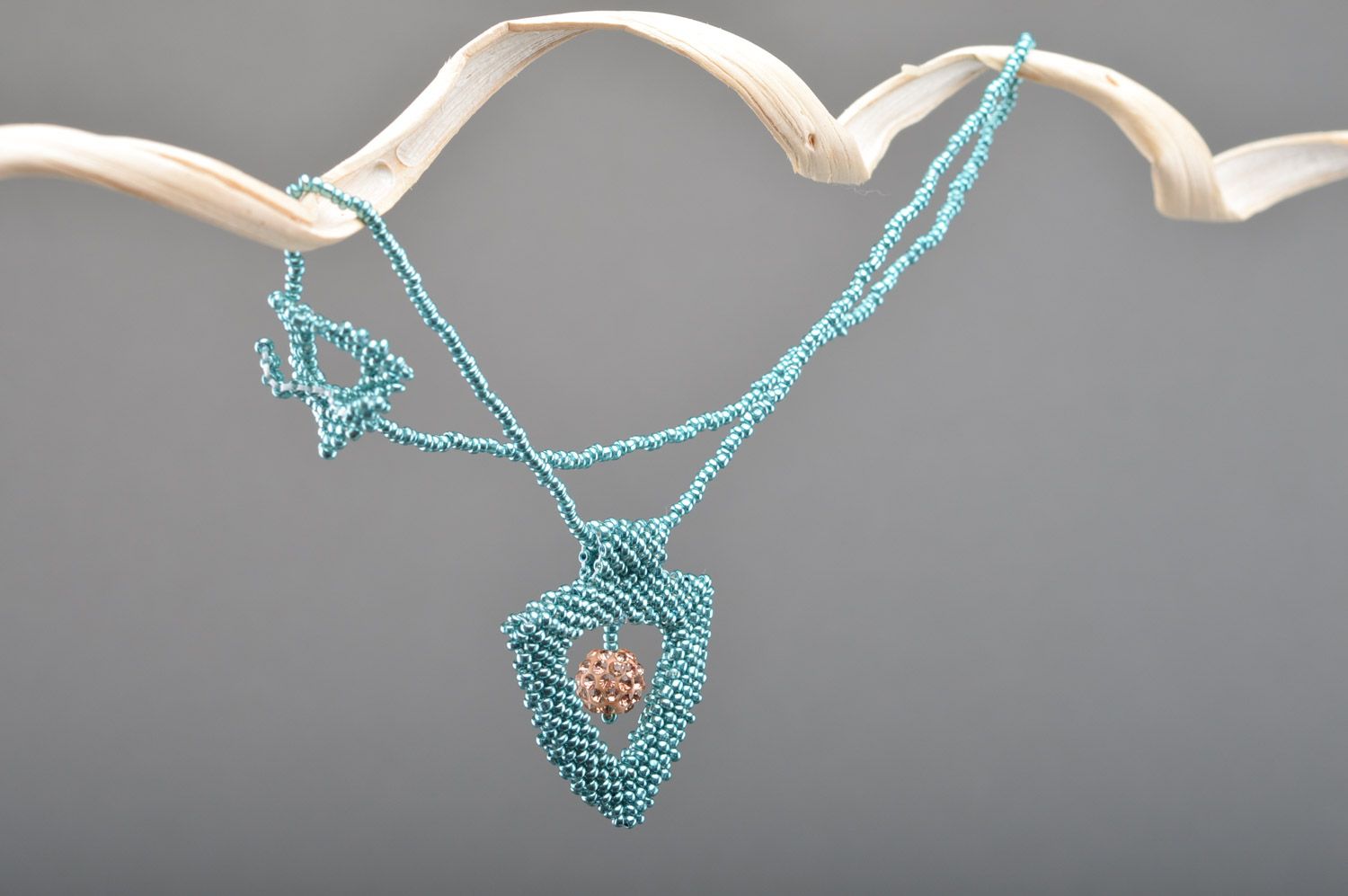 Handmade light blue triangle neck pendant woven of beads on cord with toggle lock photo 1