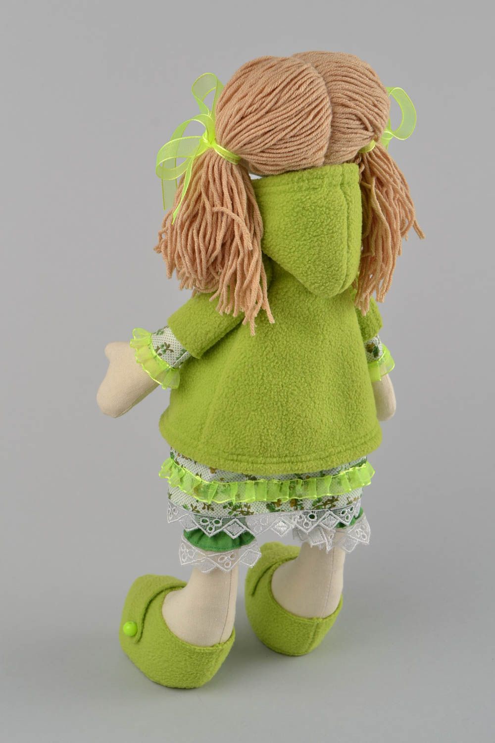 Handmade designer fabric soft doll girl in green clothing with pig tails photo 5