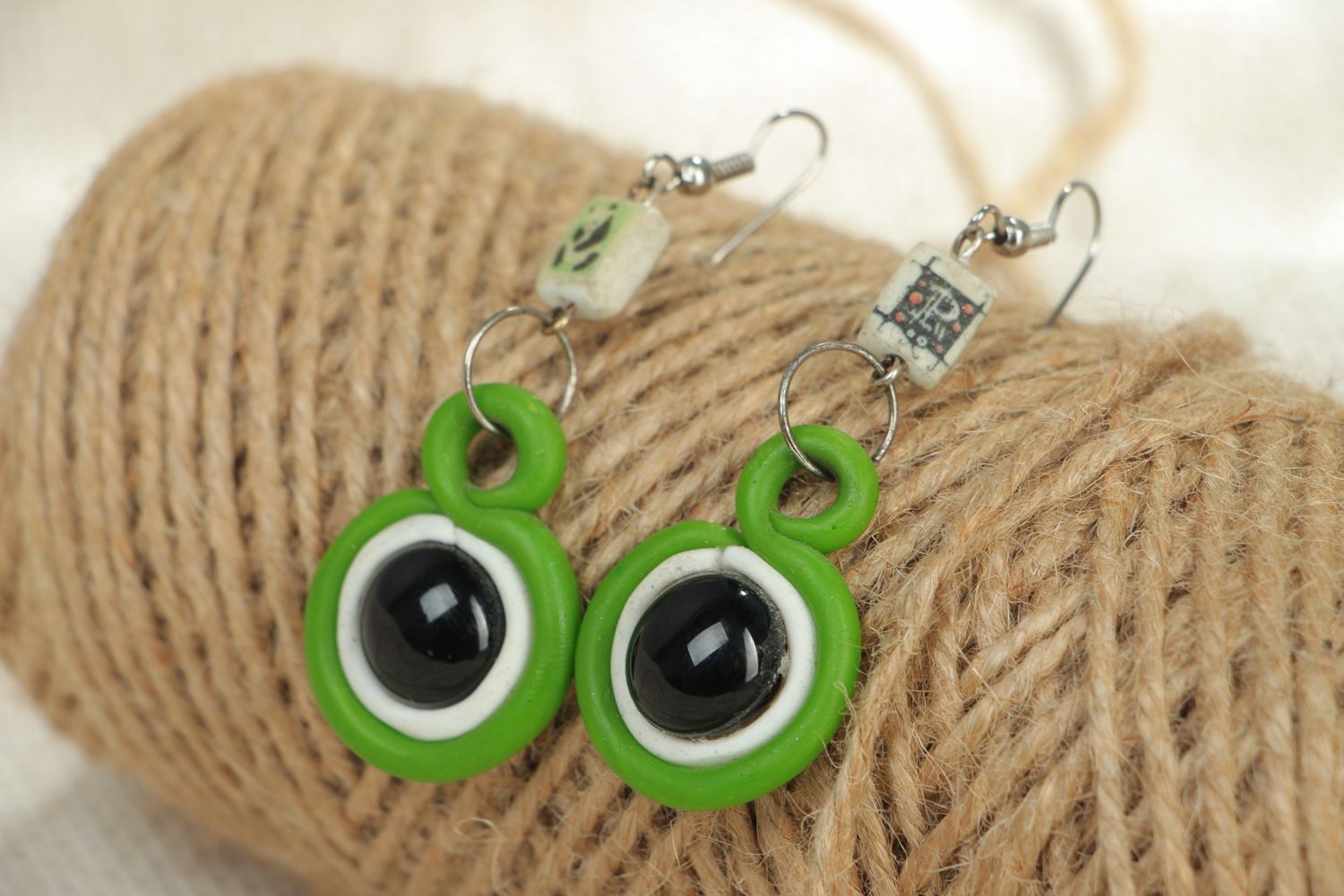 Round polymer clay dangle earrings of green color photo 4