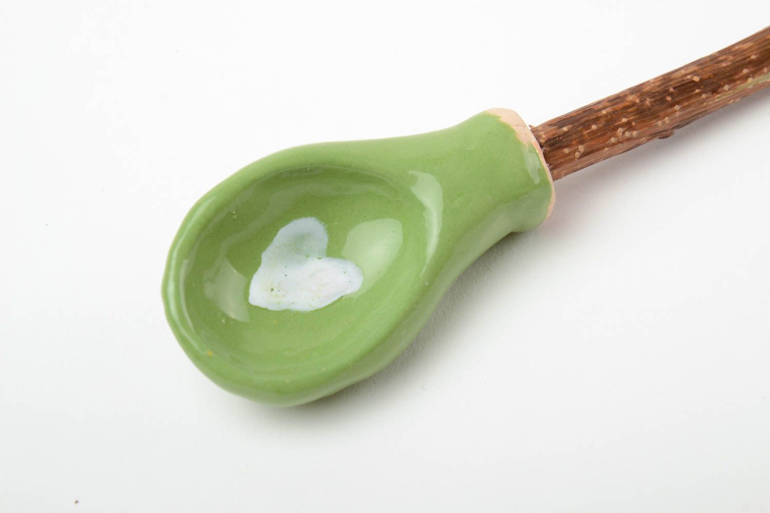 Glazed green handmade designer clay spoon with apricot branch handle photo 4