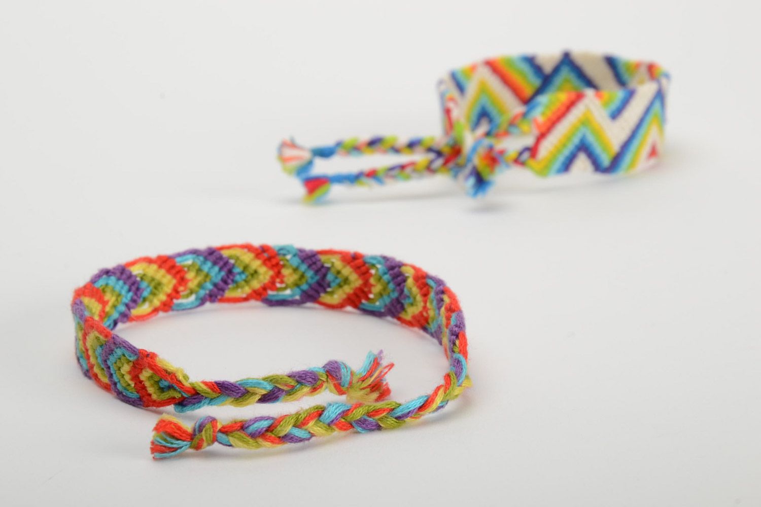 Set of 2 handmade friendship wrist bracelets woven of colorful embroidery floss photo 3