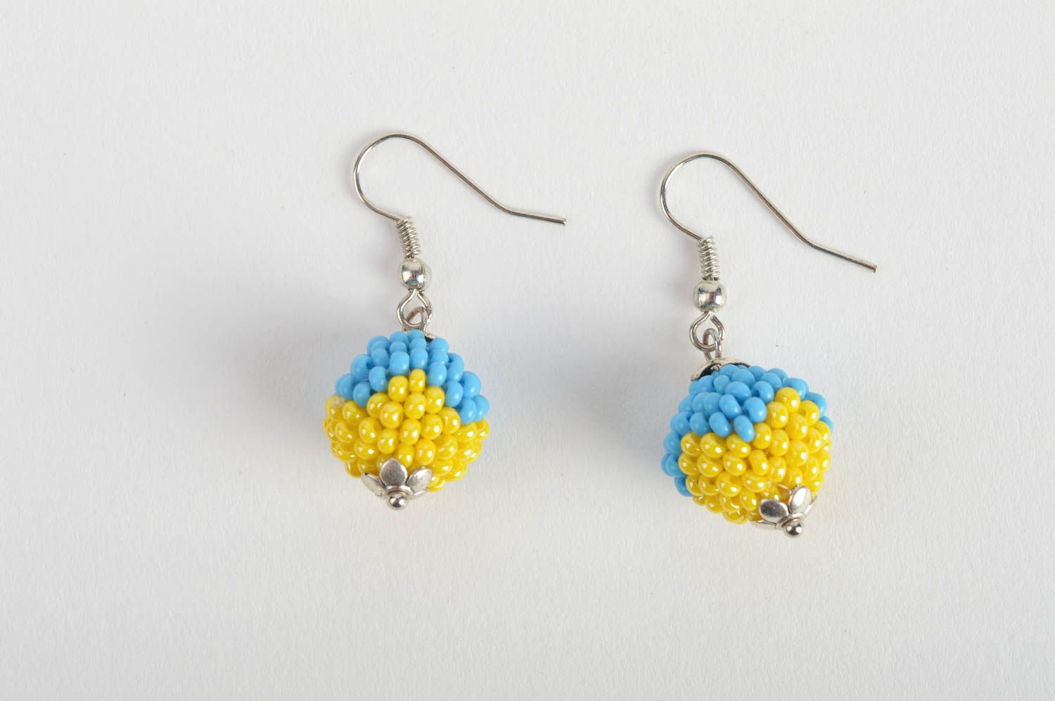 Handmade ball shaped dangle earrings woven of blue and yellow Czech beads photo 2
