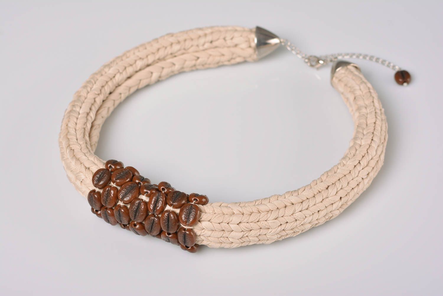 Hand-knitted necklace made of synthetics with the coffee beans of polymer clay  photo 5