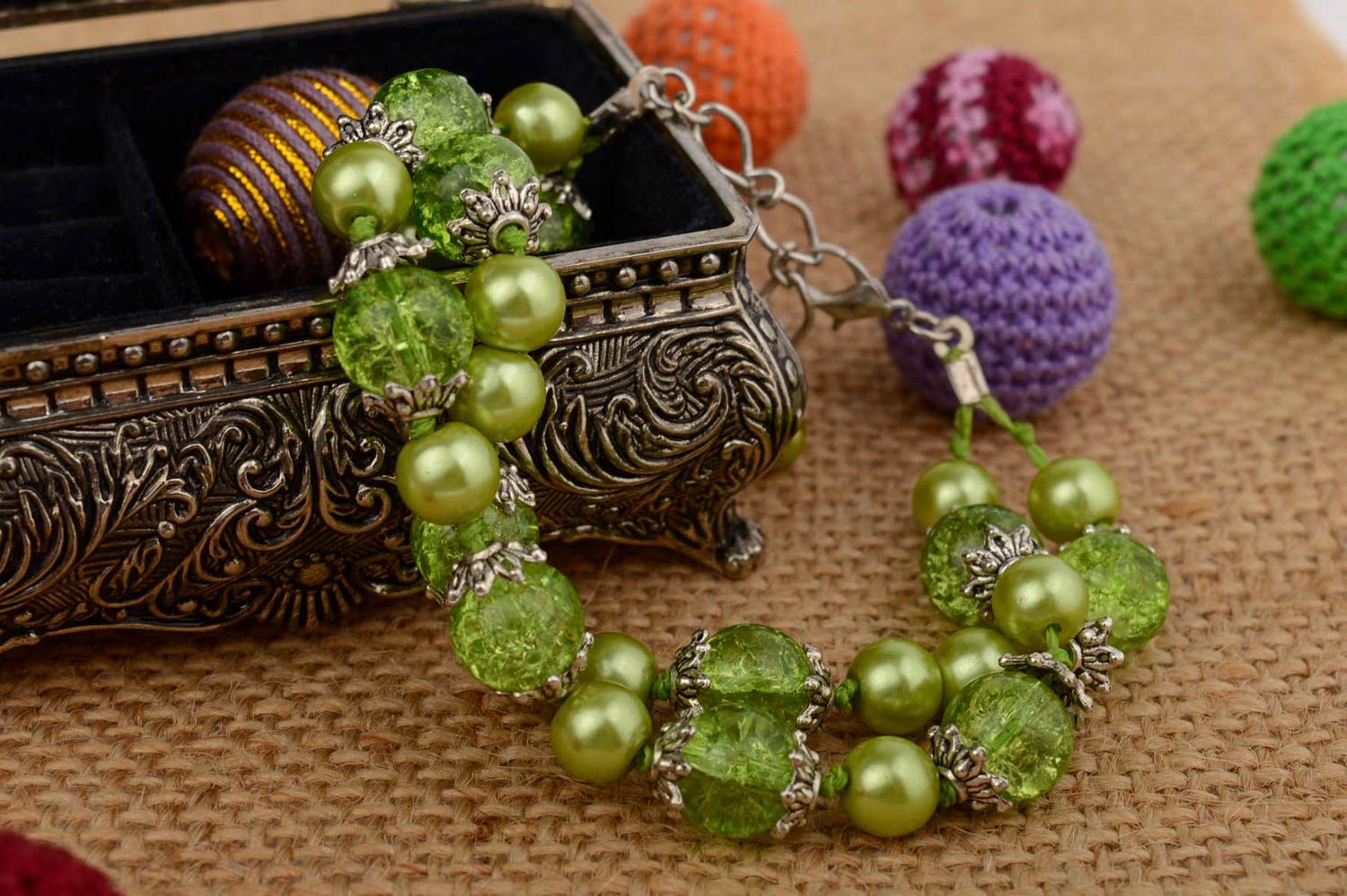 Handmade festive beaded green bracelet with ceramic pearls  photo 1