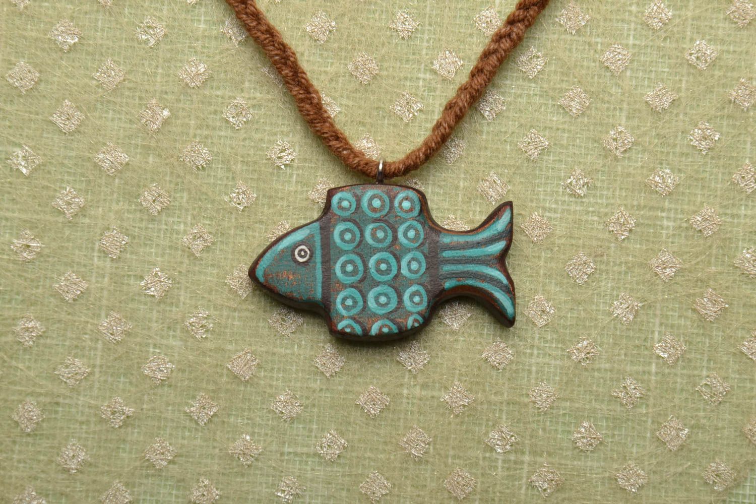 Wooden pendant in the shape of fish photo 1