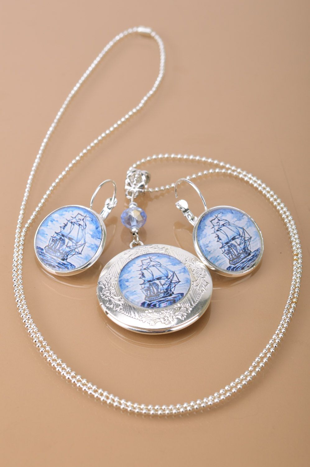 Handmade set in marine style of metal jewelry earrings and locket pendant with space for photo  photo 2