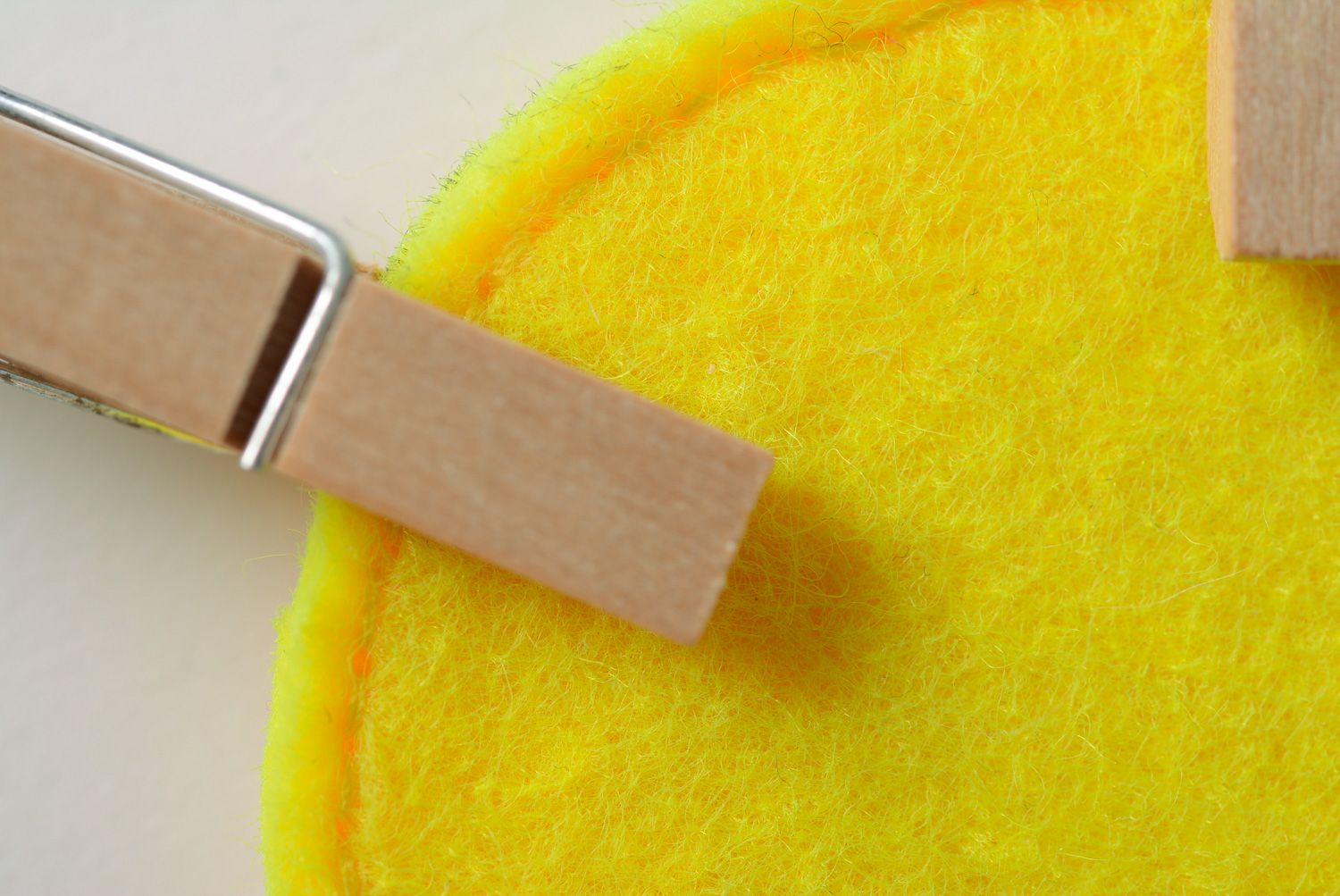 Bright yellow handmade educational toy sewn of felt with clothes pins Sun photo 5