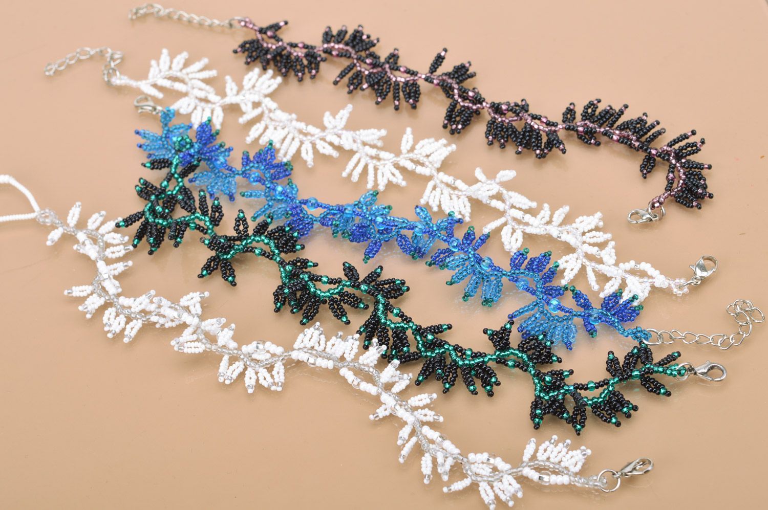 Handmade designer wrist bracelet woven of black and green Czech beads Leaves photo 5