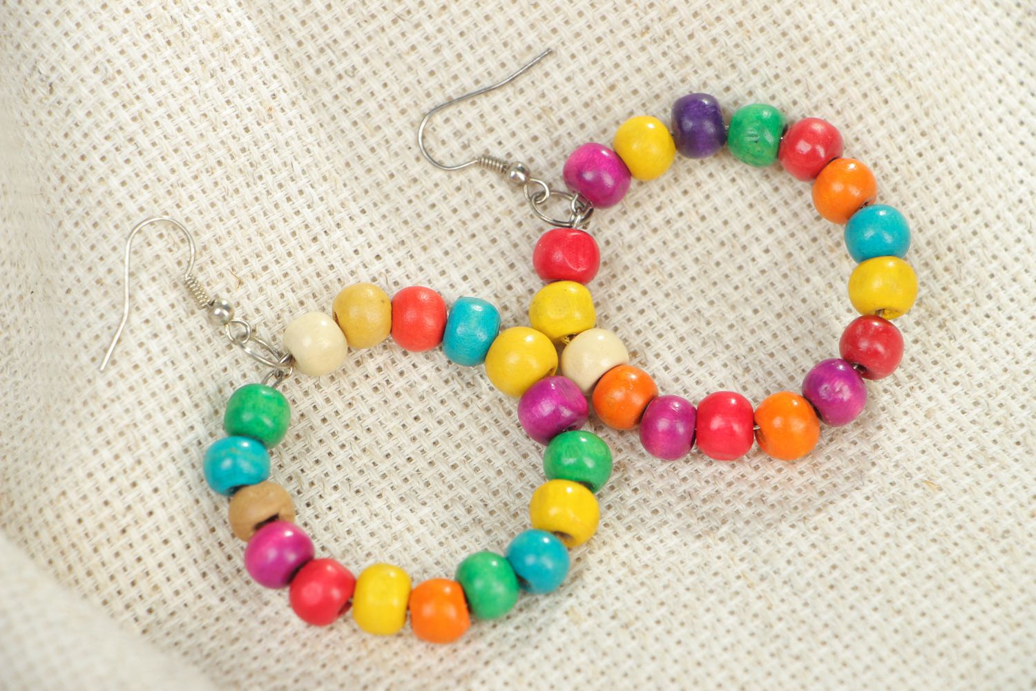 Large hoop earrings with colorful wooden beads photo 4