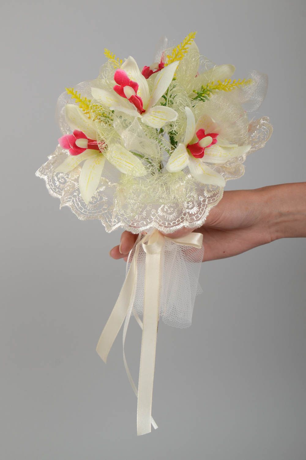 Beautiful wedding bouquet made of handmade artificial flowers with orchids photo 4