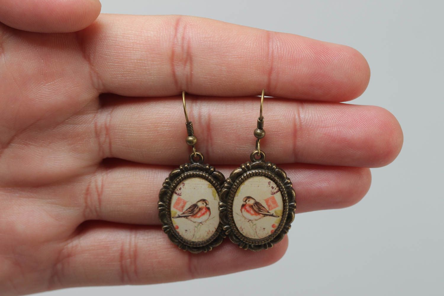 Handcrafted vintage oval earrings made of glass glaze with bullfinch prints on them photo 5