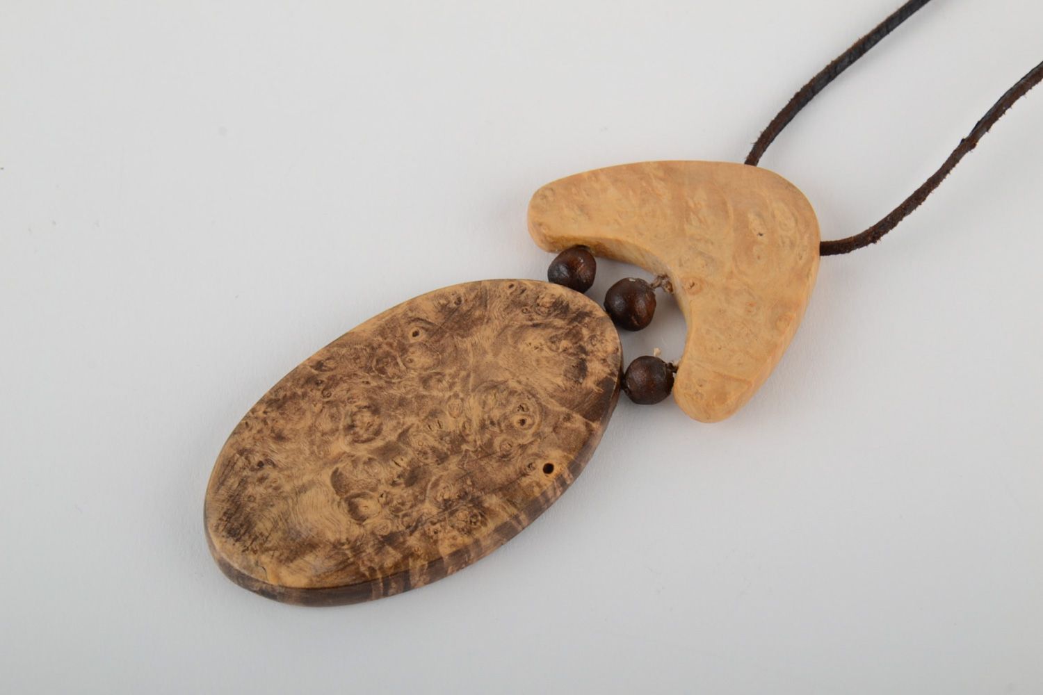 Handmade tinted oval neck pendant carved of wood with intarsia for women photo 3