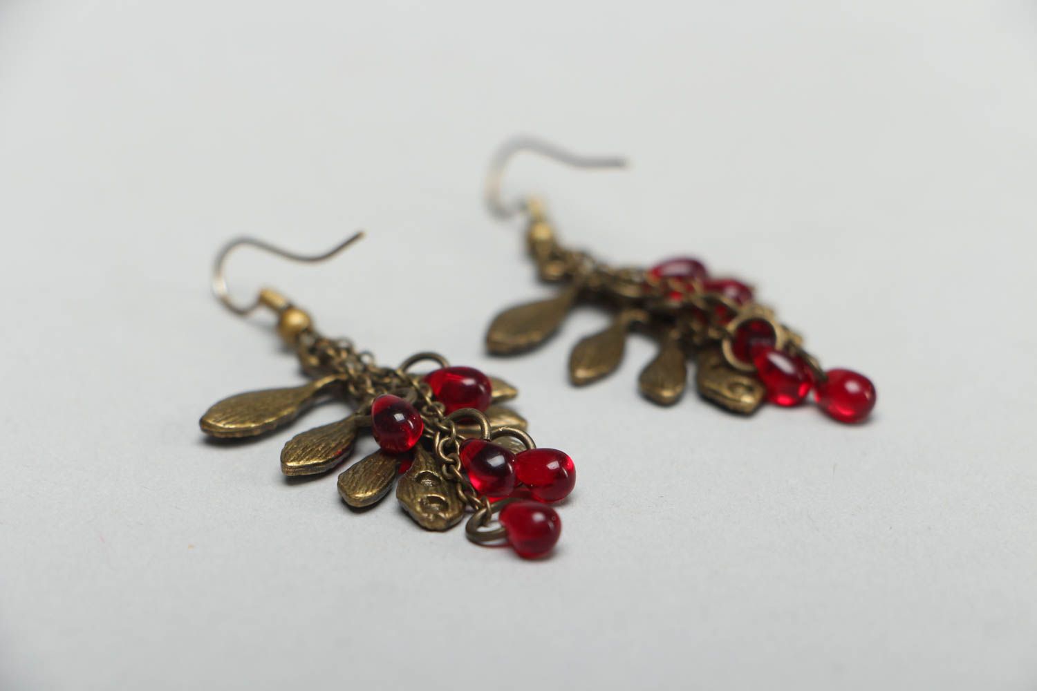 Metal earrings with plastic beads photo 2