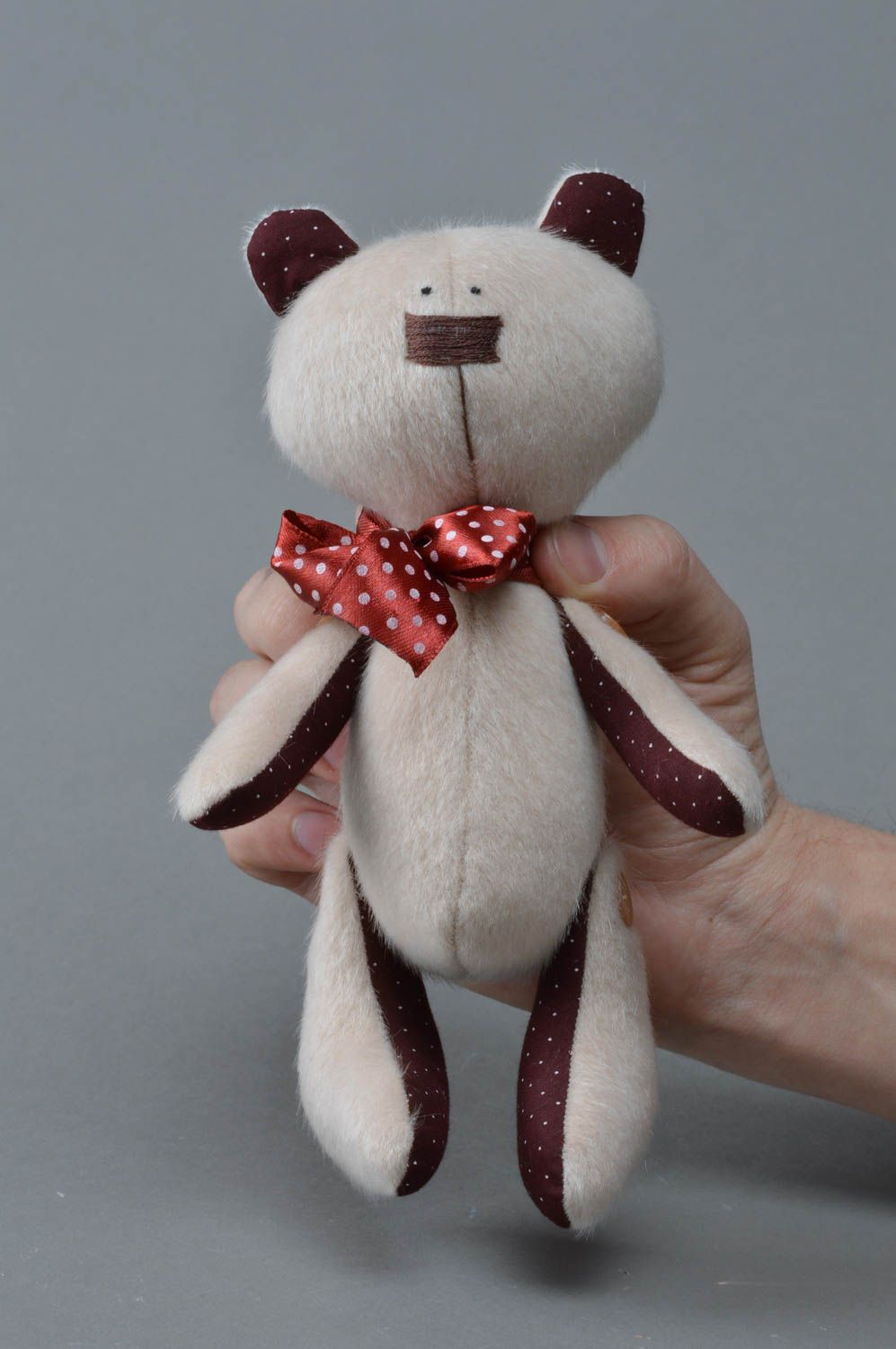 Handmade faux fur and cotton fabric soft toy bear with red satin bow tie photo 4