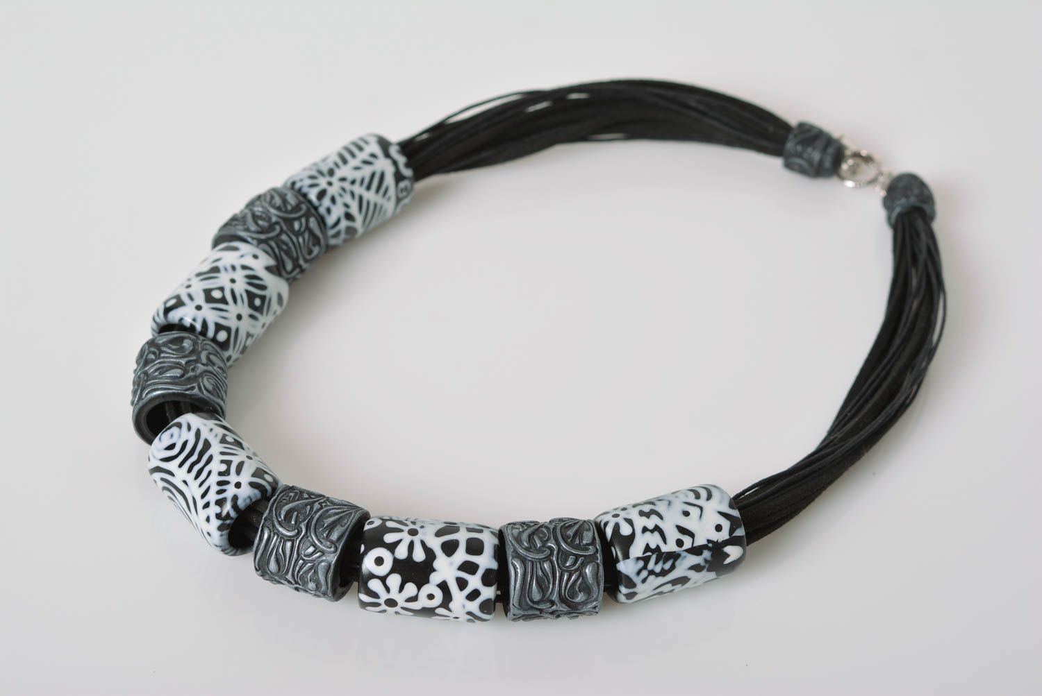 Handmade designer necklace with black and white polymer clay beads on waxed cord photo 2