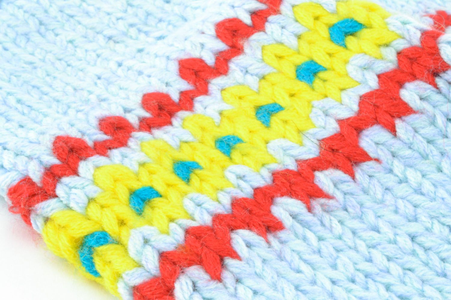 Moufles tricotées en laine bleu clair photo 5