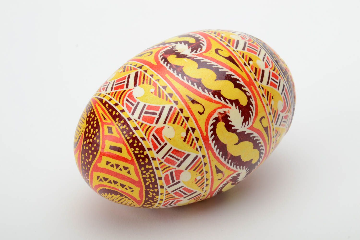 Homemade designer decorative Easter egg pysanka painted with wax and aniline dyes photo 2