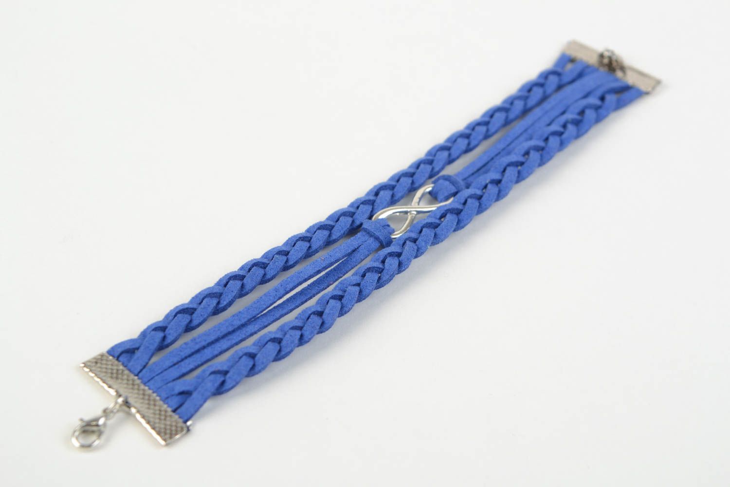 Pulsera artesanal de cordón de gamuza con dije de color azul infinidad  foto 5
