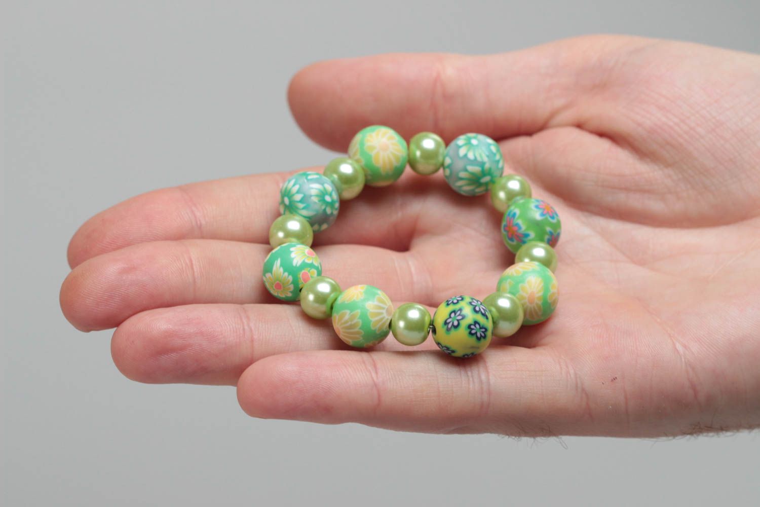 Beautiful children's handmade polymer clay wrist bracelet of green color photo 5