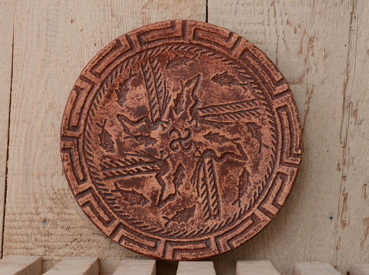 Plato de barro-amuleto Dragones foto 1