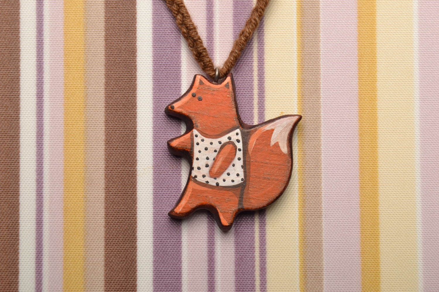 Wooden pendant in the shape of fox photo 1