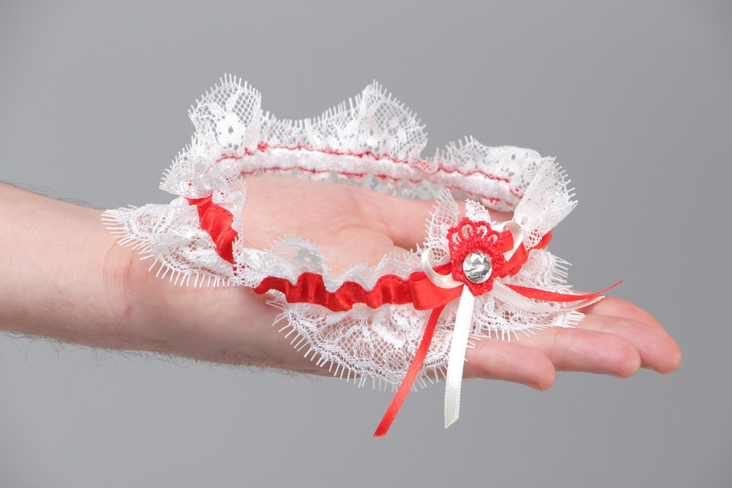 Handmade white wedding bridal garter with French lace and red satin ribbon photo 5