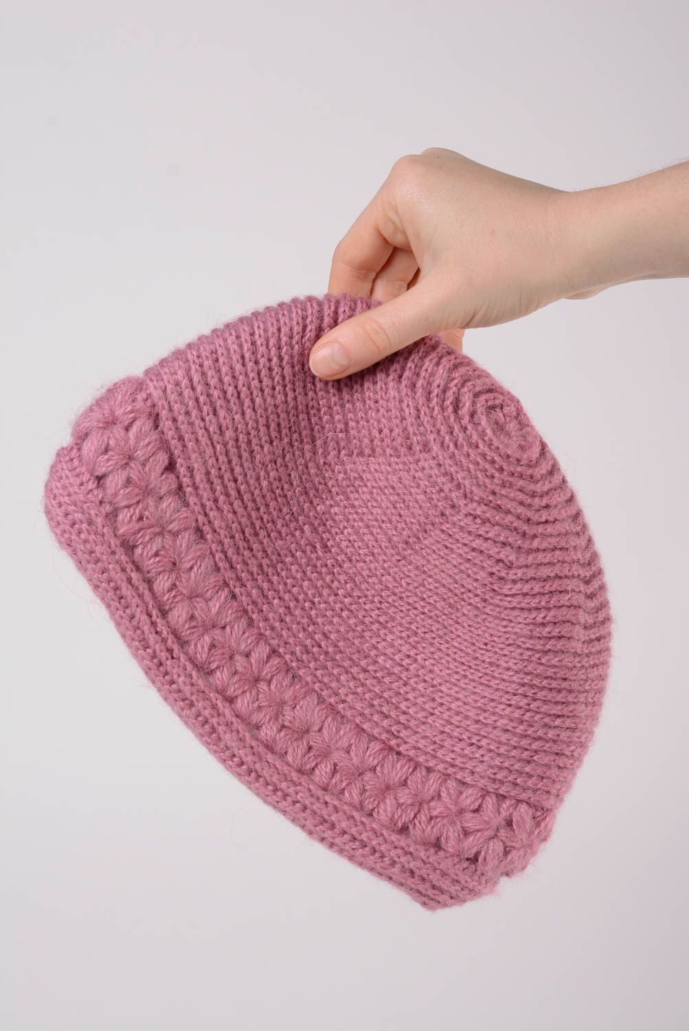 Handmade warm women's hat knitted of woolen threads of dark pink color photo 5