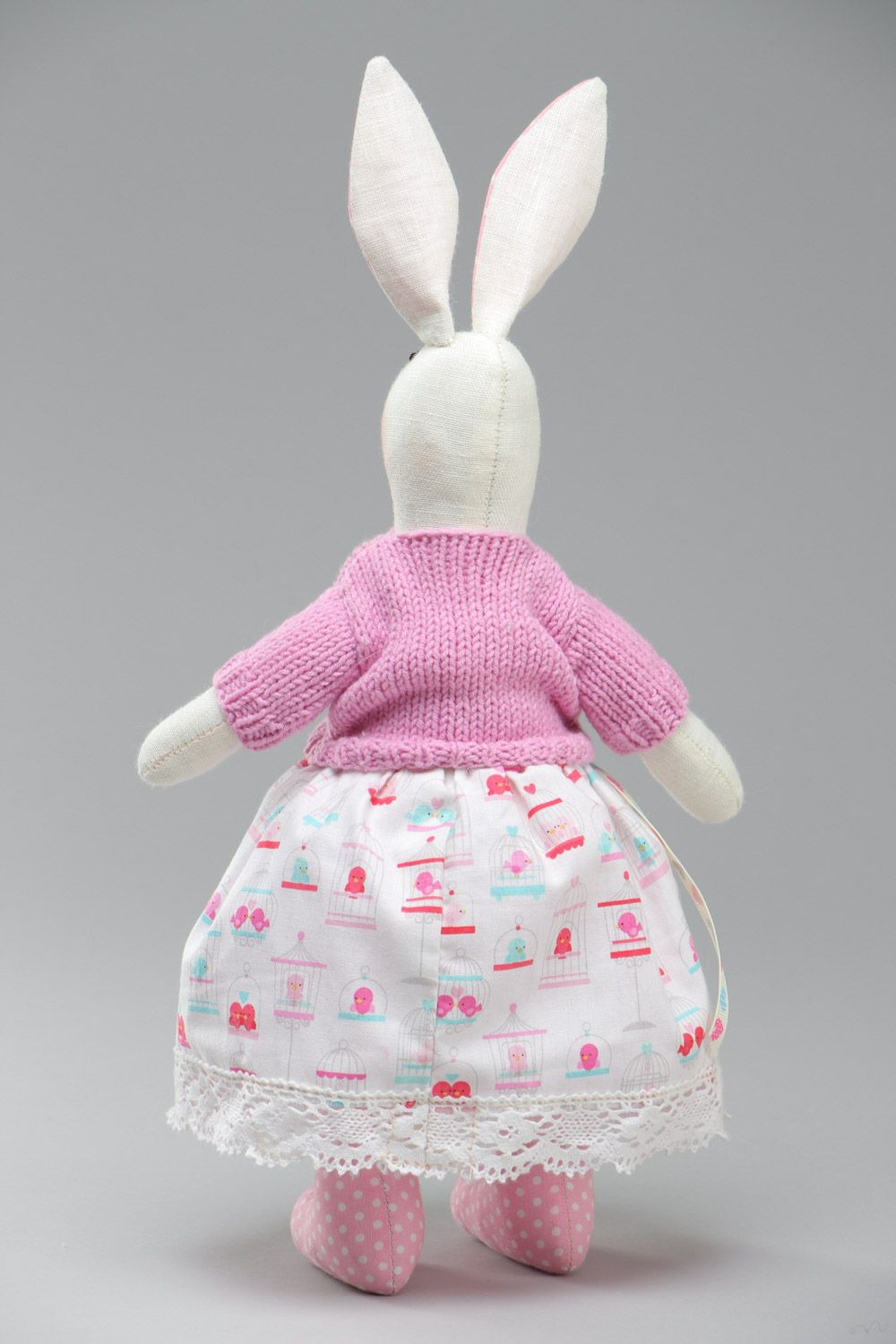 Funny handmade soft toy rabbit in pink knit jacket and floral skirt for kids photo 4
