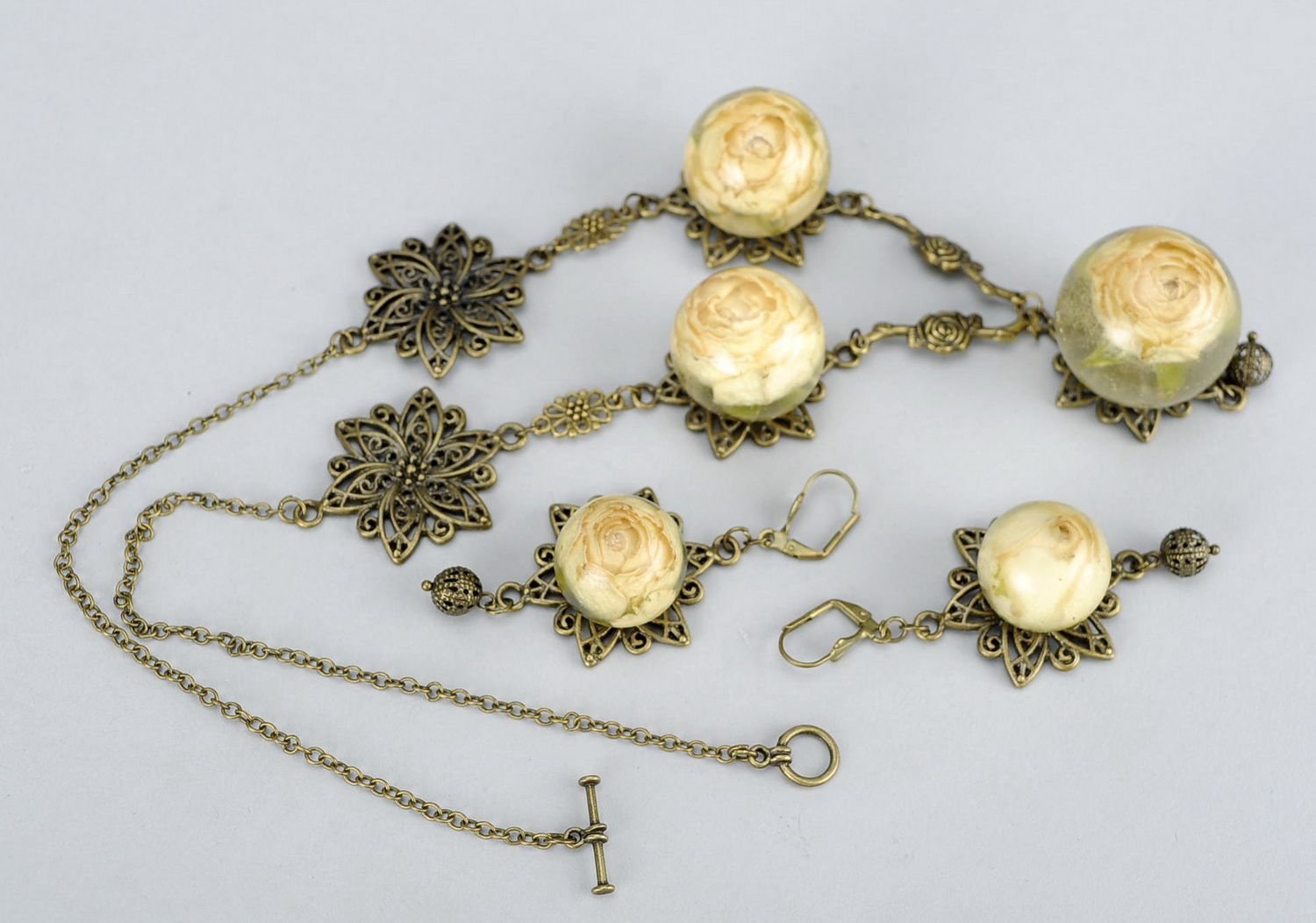 Jewelry set with epoxy resin: earrings, pendant photo 3