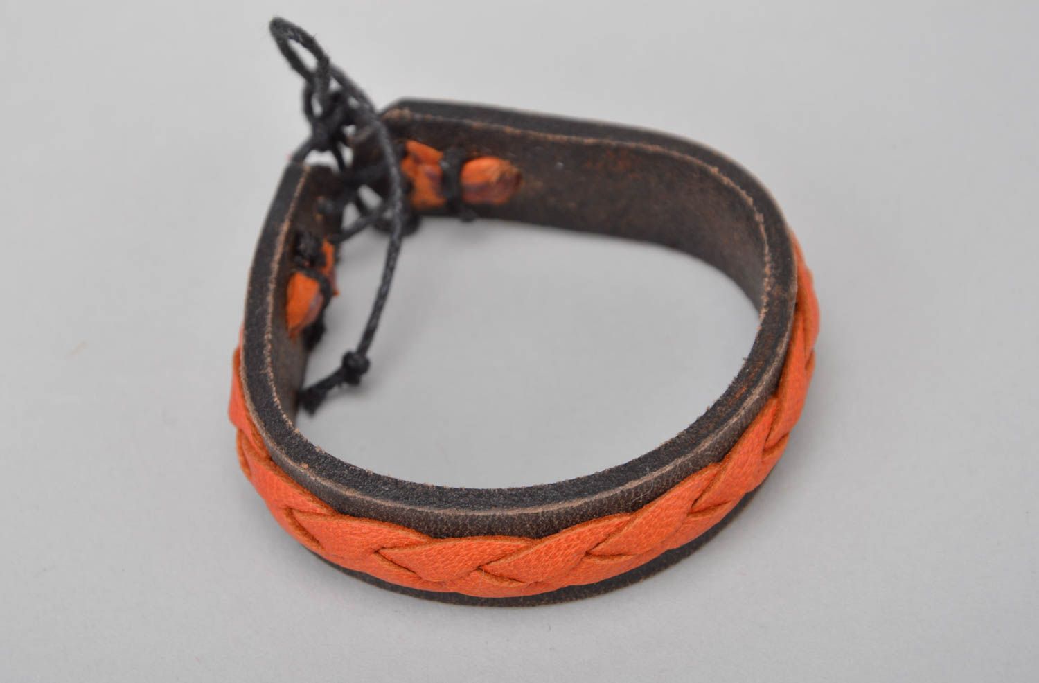 Handmade designer brown and orange genuine leather wrist bracelet with ties photo 2