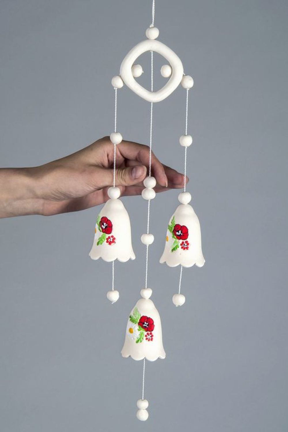 Ceramic hanging bells with poppies and camomiles photo 1
