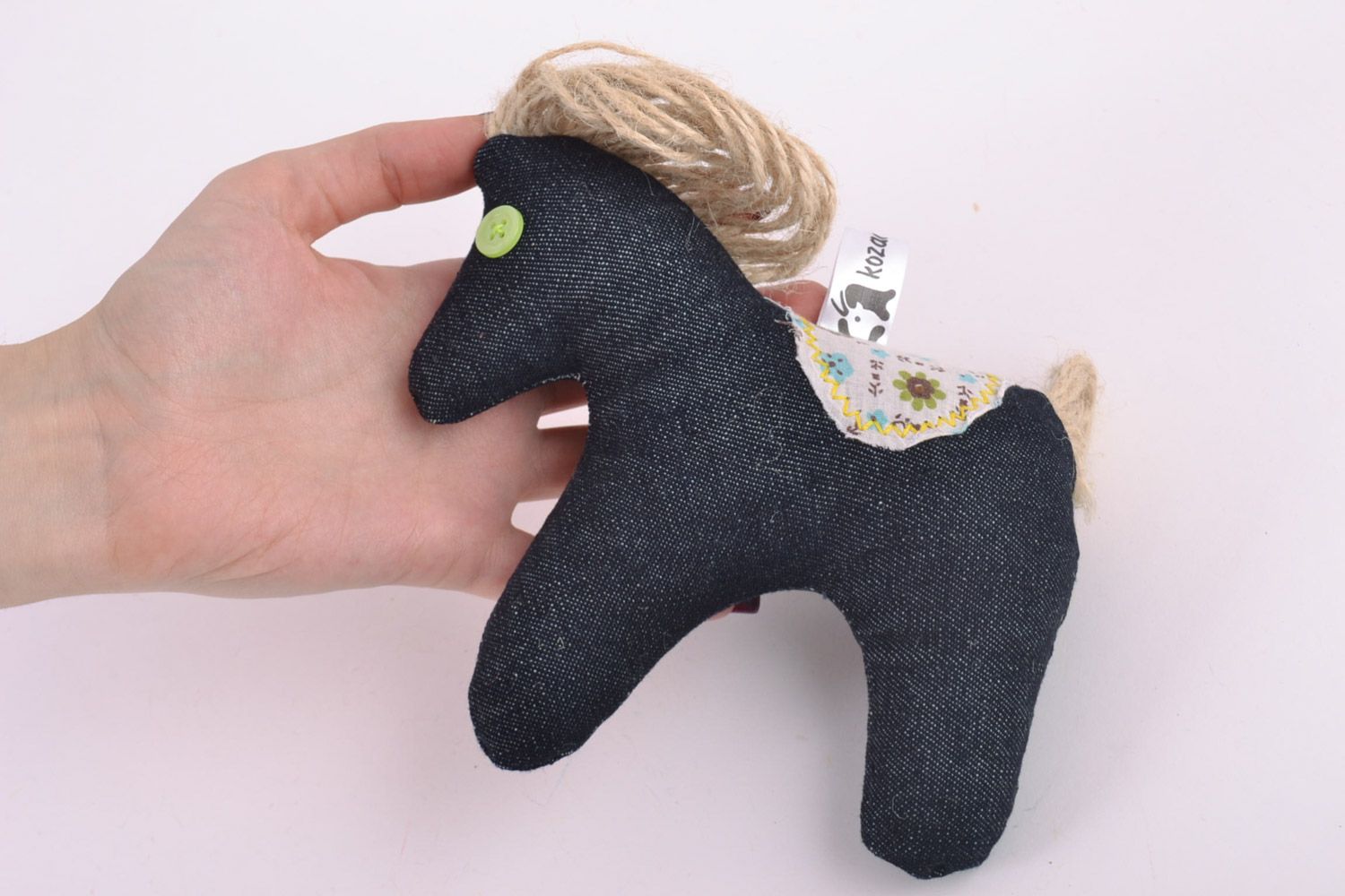 Handmade small soft toy sewn of dark blue fabric with embroidery and cord horse  photo 5