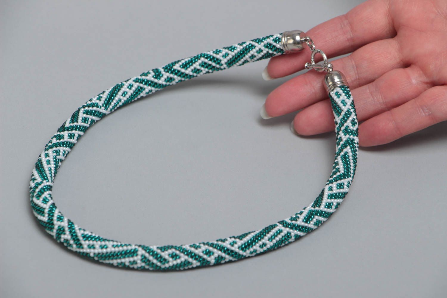 Handmade designer beaded cord necklace with white and turquoise colors pattern photo 4